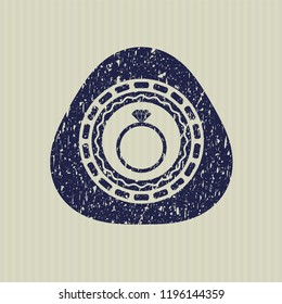 Blue diamond ring icon inside distressed rubber texture