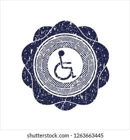Blue disabled (wheelchair) icon inside distressed rubber grunge seal