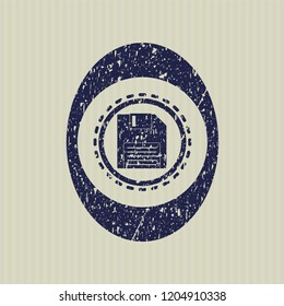 Blue diskette icon inside distress rubber grunge texture seal