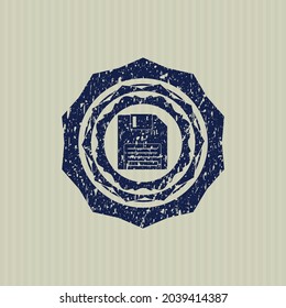 Icono de disquete azul dentro del estampado de grunge. 