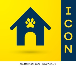Blue Dog house and paw print pet icon isolated on yellow background. Dog kennel. Vector Illustration