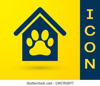 Blue Dog house and paw print pet icon isolated on yellow background. Dog kennel. Vector Illustration