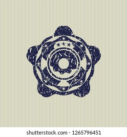 Blue donut icon inside distressed rubber grunge seal