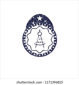 Blue drawing compass icon inside distressed grunge style stamp