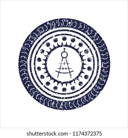Blue drawing compass icon inside distress rubber seal