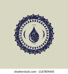 Blue drop icon inside grunge seal