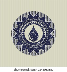 Blue drop icon inside rubber stamp