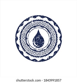 Blue drop icon inside rubber stamp with grunge texture. 