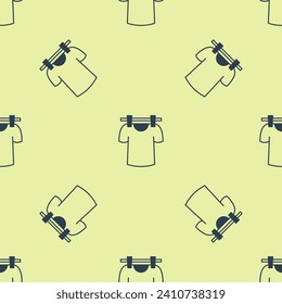 Blue Drying clothes icon isolated seamless pattern on yellow background. Clean shirt. Wash clothes on a rope with clothespins. Clothing care and tidiness.  Vector