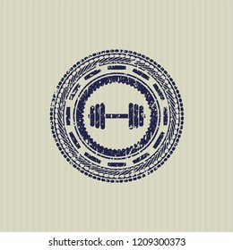 Blue dumbbell icon inside distressed rubber grunge seal
