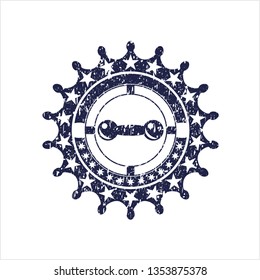 Blue dumbbell icon inside distressed grunge style stamp