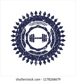 Blue dumbbell icon inside rubber grunge texture seal