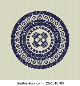 Blue dumbbell icon inside rubber grunge seal