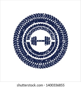 Blue dumbbell icon inside rubber stamp