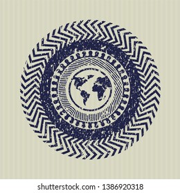 Blue earth icon inside distressed grunge stamp