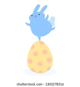 Blue Easter Bunny. Fluffy cartoon rabbit balancing on a polka dots Easter egg.