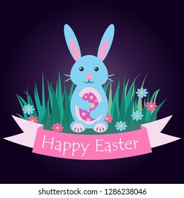 Blue Easter Bunny sitting on the grass and holding a beautiful Easter egg with stars