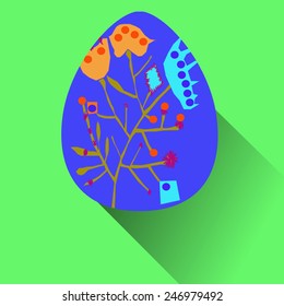 Blue Easter egg with floral ornaments   on a green   background. Hand drawn. 