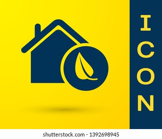 Blue Eco friendly house icon isolated on yellow background. Eco house with leaf. Vector Illustration