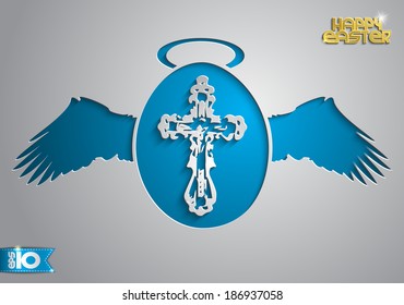 Blue egg with wings and a cross made ??of paper