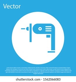 Blue Electric drill machine icon isolated on blue background. Repair tool. White circle button. Vector Illustration