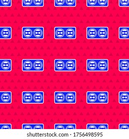 Blue Electrical outlet icon isolated seamless pattern on red background. Power socket. Rosette symbol.  Vector Illustration