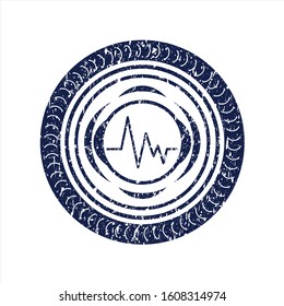 Blue electrocardiogram icon inside rubber grunge seal