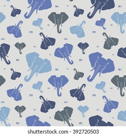 Blue elephants on a gray background. Seamless pattern. Vector. EPS 10. The press on fabric, paper and other things. Backgrounds with wild animals.