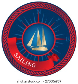 Blue emblem with sailboats, compass and ribbon
