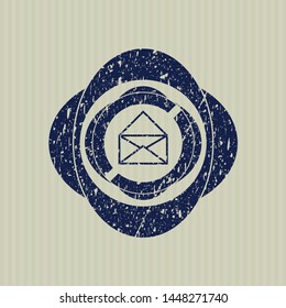 Blue envelope icon inside distressed with rubber seal texture