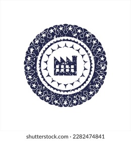 Icono de la fábrica azul dentro de la textura de caucho. 