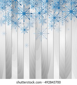 Blue falling snowflakes on grey wooden background. Vector template design