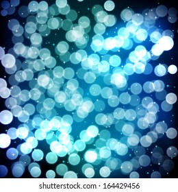 Blue festive background. Elegant abstract background with bokeh defocused lights.