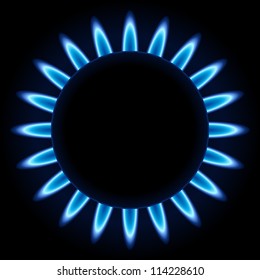Blue flames ring of kitchen burner isolated on black background.