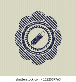 Blue flash drive icon inside distressed rubber grunge stamp