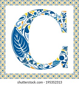 Blue floral capital letter C in frame made of Portuguese tiles