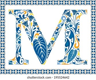 Blue floral capital letter M in frame made of Portuguese tiles
