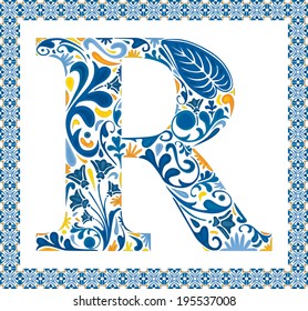 Blue floral capital letter R in frame made of Portuguese tiles