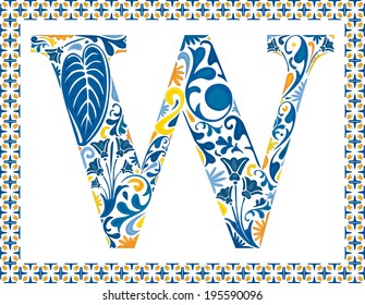 Blue floral capital letter W in frame made of Portuguese tiles