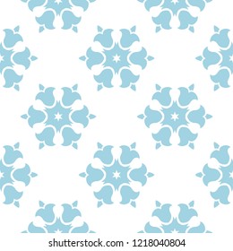 Blue floral ornament on white background. Seamless pattern for textile and wallpapers