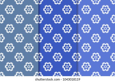 Blue floral ornaments. Set of vertical seamless patterns. Wallpaper backgrounds