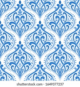 Blue floral seamless pattern with ornamental stripes. Traditional oriental motifs. Vintage ornament template. Decorative paisley elements. Great for fabric and textile.