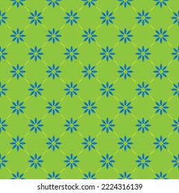 Blue flower pattern on green background. Eight blue petals flowers pattern. Beautiful flower pattern wrapping.