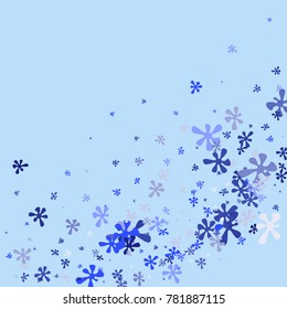 Blue flowers on a blue background. Abstraction with flowers. Blue confetti. Blue flowers. Spring. A scattering of confetti. Placer from the flowers.