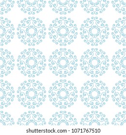 Blue flowers on white background. Ornamental seamless pattern for textile and wallpapers