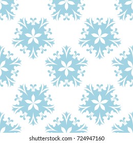 Blue flowers on white background. Ornamental seamless pattern for textile and wallpapers