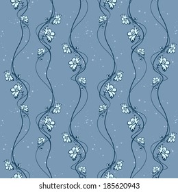 Blue flowers wavy background. Seamless pattern. Flowers on wavy stems and dotted background. Colors of old blue jeans. Vector is grouped EPS8. Drop into your AI swatches and use as fill.