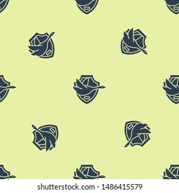 Blue Flying duck on shield icon isolated seamless pattern on yellow background. Hunting trophy on wall.  Vector Illustration