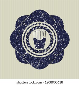 Blue fries icon inside distress rubber seal with grunge texture