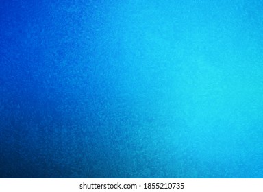 Blue frozen window covered with frost.